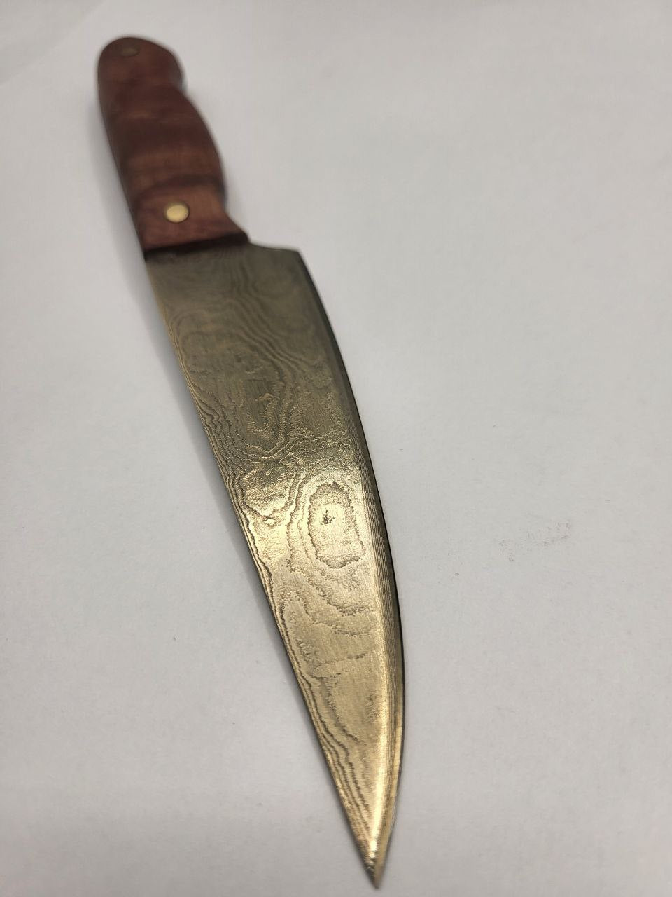 Detailaufnahme vom Gold Edition Jausenmesser mit Damaststruktur